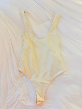 Yellow bodysuit